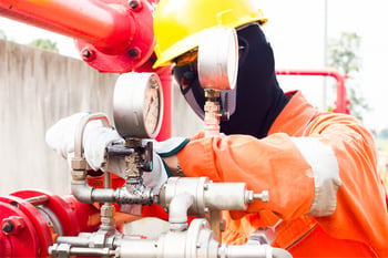 Technician repairing a pump after deadheading